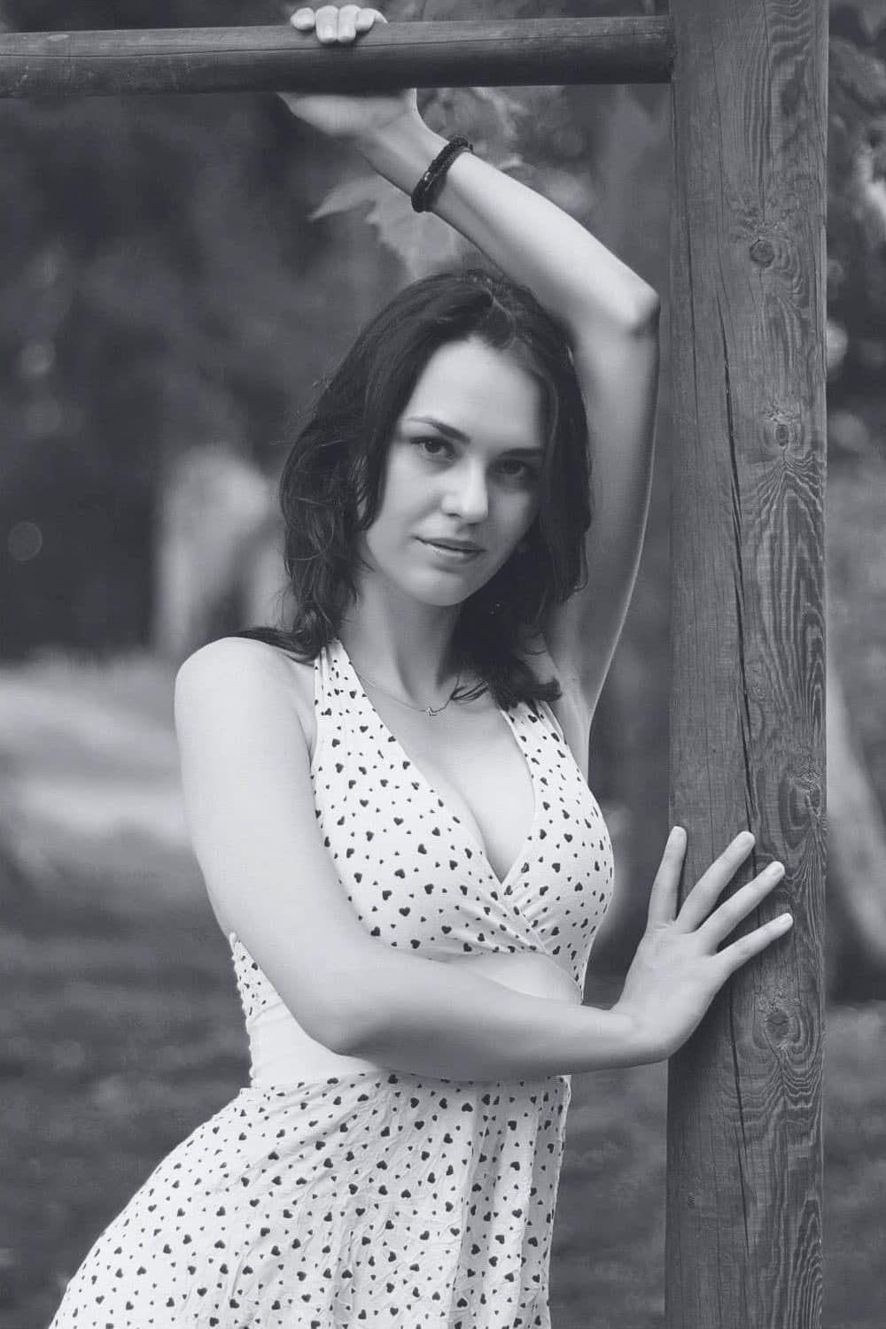 Full-body portrait with natural posing and background